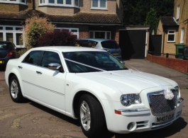 Modern White Chrysler for weddings in Watford